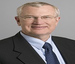 John E Tomaszewski